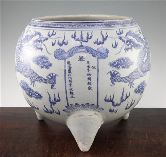 A massive Chinese blue and white dragon tripod censer, Qianlong mark and of the period (1736-95)